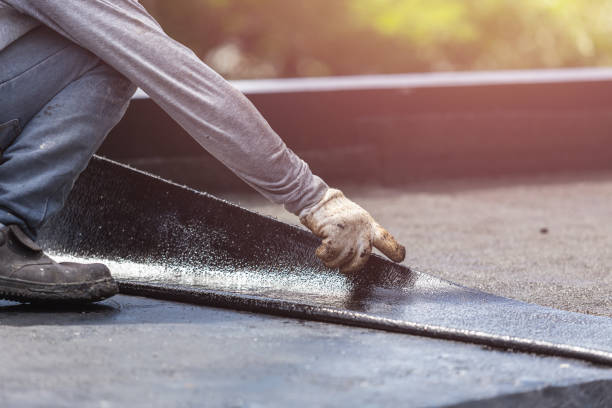 Professional Emergency Waterproofing technician working in Davisburg, MI